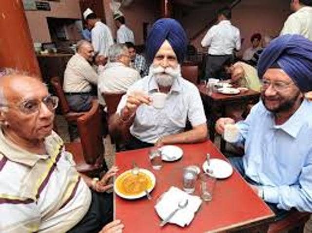 Customers that have been coming to the Indian Coffee House in Sector 17 everyday and sitting at the same table for the last 40 years. (HT File Photo)