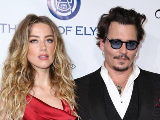 In this file photo, Amber Heard and Johnny Depp arrive at The Art of Elysium’s Ninth annual Heaven Gala at 3LABS, in Culver City, Calif.(AP)