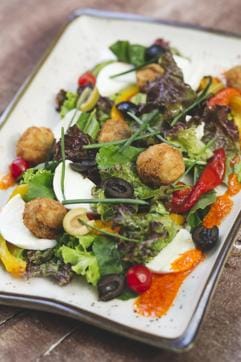 The light, mozzarella and chicken croquettes salad has fresh, creamy mozzarella that balances the tanginess of the crunchy and colourful salad. The light, mozzarella and chicken croquettes salad has fresh, creamy mozzarella that balances the tanginess of the crunchy and colourful salad.