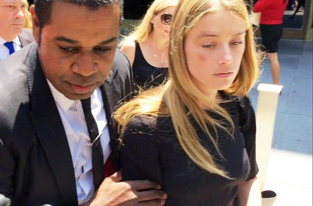 Actress Amber Heard leaves the Superior Court of Los Angeles in Los Angeles, California, U.S. May 27, 2016, with what appears to be a bruise on her right cheek after obtaining a restraining order against husband Johnny Depp in this still image from video. (REUTERS) Actress Amber Heard leaves the Superior Court of Los Angeles in Los Angeles, California, U.S. May 27, 2016, with what appears to be a bruise on her right cheek after obtaining a restraining order against husband Johnny Depp in this still image from video. (REUTERS)