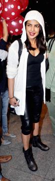 Priyanka Chopra returns to Mumbai after completing her part of the Baywatch shoot in USA. (PTI) Priyanka Chopra returns to Mumbai after completing her part of the Baywatch shoot in USA. (PTI)