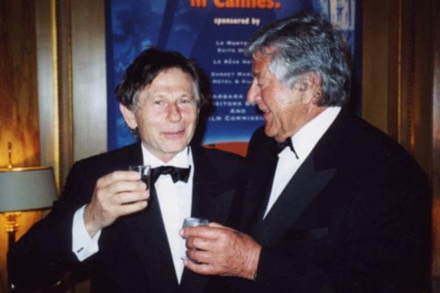 In this May 2002 photo, producer Gene Gutowski, right, chats with film director Roman Polanski in Cannes, France. (AP) In this May 2002 photo, producer Gene Gutowski, right, chats with film director Roman Polanski in Cannes, France. (AP)