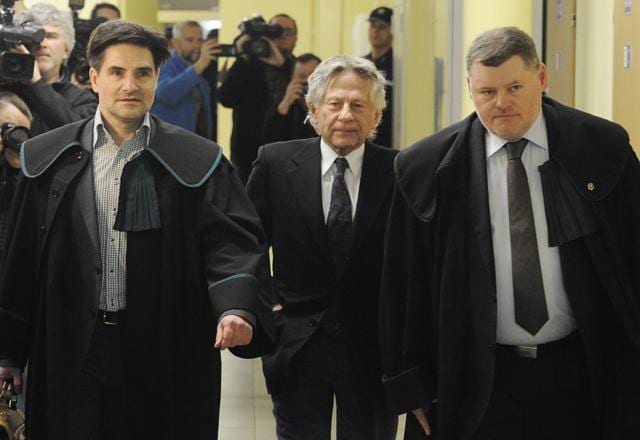 In this Feb. 25, 2015 file photo filmmaker Roman Polanski, centre, with his lawyers, arrives at the regional court in his childhood city of Krakow, Poland. (AP) In this Feb. 25, 2015 file photo filmmaker Roman Polanski, centre, with his lawyers, arrives at the regional court in his childhood city of Krakow, Poland. (AP)
