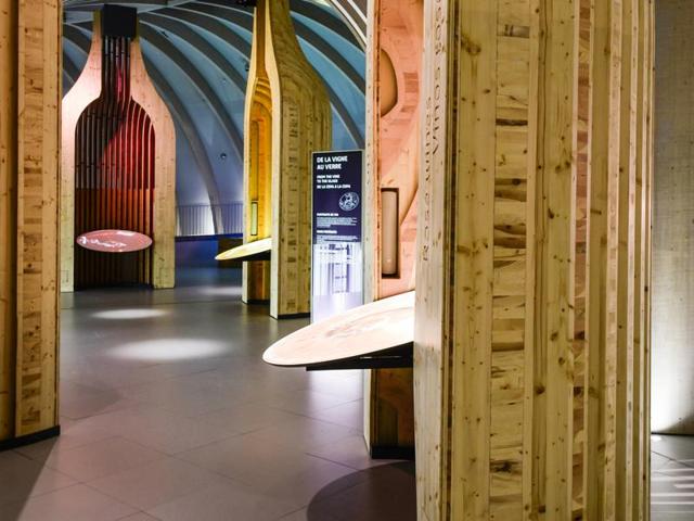 Wine portraits: In this space, giant wine bottles teach visitors about the Big Six wine grapes, including their history, flavor and legends. (AFP)