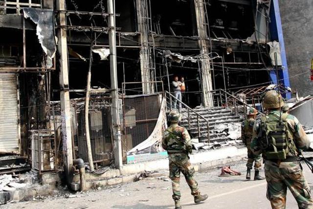 A shop gutted in fire during the Jat agitation. (HT File Photo) A shop gutted in fire during the Jat agitation. (HT File Photo)