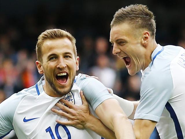 Harry Kane celebrates with Jamie Vardy after scoring the first goal for England.(Reuters Photo)