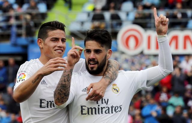 Real Madrid's Francisco "Isco" Alarcon (right) with team mate James Rodriguez. (Reuters Photo)