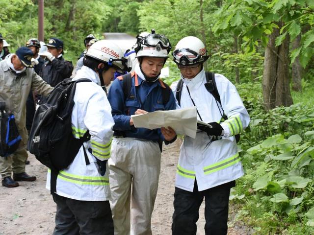 Rescuers search for a 7-year-old boy who is missing in a Japanese forest in Nanae town, on Hokkaido, the northernmost of Japan's four main islands. (AP Photo) Rescuers search for a 7-year-old boy who is missing in a Japanese forest in Nanae town, on Hokkaido, the northernmost of Japan's four main islands. (AP Photo)
