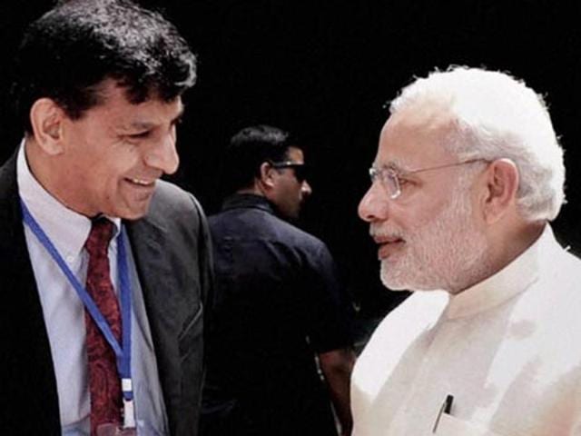 Modi-RRBI governor Raghuram Rajan and PM Modi. (PTI) Modi-RRBI governor Raghuram Rajan and PM Modi. (PTI)