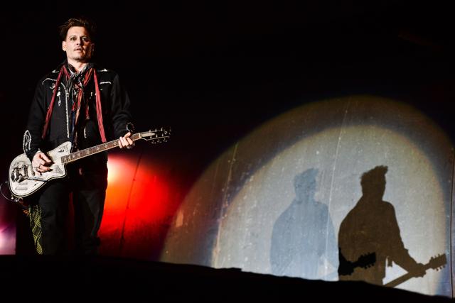Johnny Depp, guitarist of Hollywood Vampires, performs at the Rock in Rio Lisboa music festival at Bela Vista Park in Lisbon. (AFP) Johnny Depp, guitarist of Hollywood Vampires, performs at the Rock in Rio Lisboa music festival at Bela Vista Park in Lisbon. (AFP)