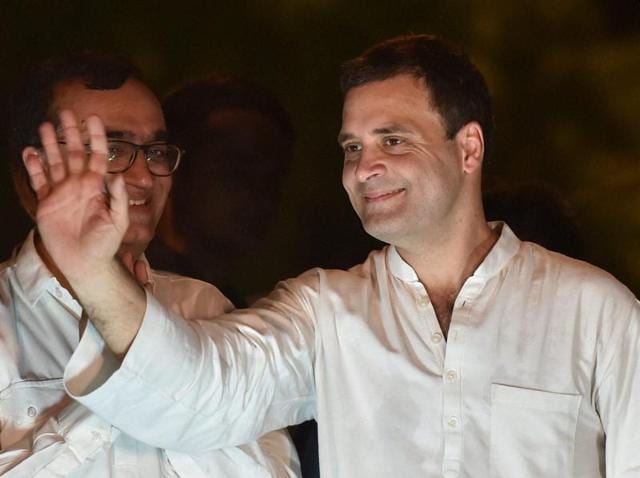 Congress vice-president Rahul Gandhi waves to party workers during a protest march against the Delhi government over power and water crisis.(PTI)