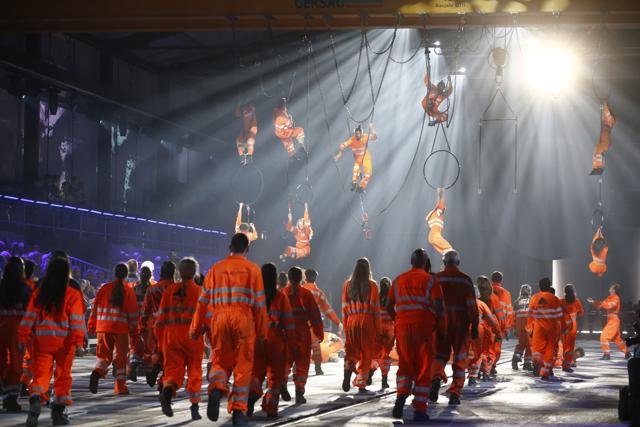 Artists perform during the opening show directed by German director Volker Hesse, on the opening day of the Gotthard rail tunnel. (AP)