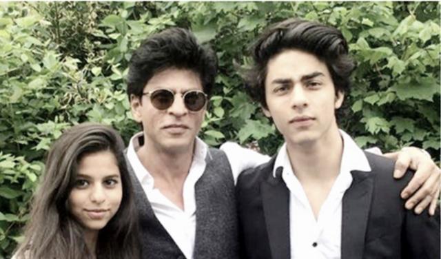 Suhana and Aryan pose with their dad.