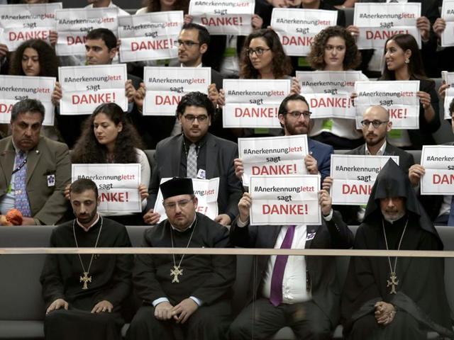 Guests hold posters of the 'recognition now' organization reading "RecognitionNow says Thank you" during a meeting of the German Federal Parliament, Bundestag, in Berlin, Germany, Thursday, June 2, 2016. (AP) Guests hold posters of the 'recognition now' organization reading "RecognitionNow says Thank you" during a meeting of the German Federal Parliament, Bundestag, in Berlin, Germany, Thursday, June 2, 2016. (AP)