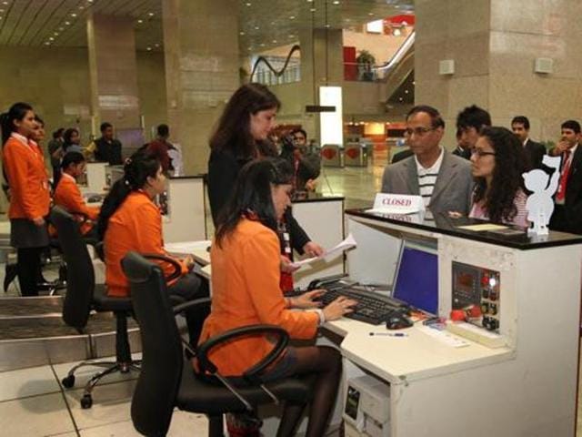 Passengers taking boarding pass at an Air India counter. Air travellers will have to fork out more money as tickets are set to get costlier on the back of higher price of jet fuel. (Hindustan Times) Passengers taking boarding pass at an Air India counter. Air travellers will have to fork out more money as tickets are set to get costlier on the back of higher price of jet fuel. (Hindustan Times)