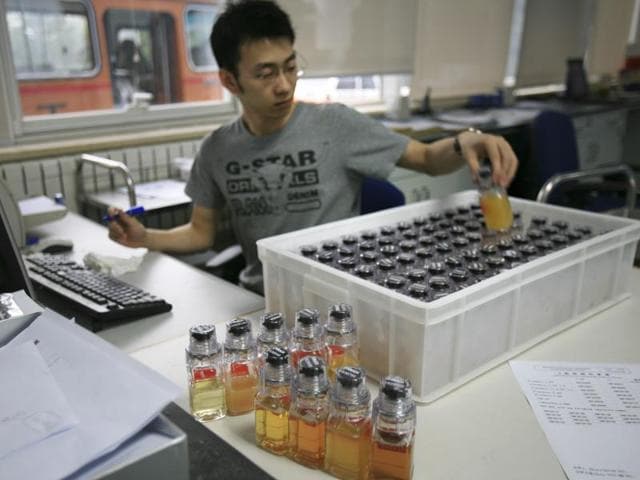 A file photo of urine samples from Chinese athletes are recorded upon arriving at China Anti-Doping Agency.(AP Photo)