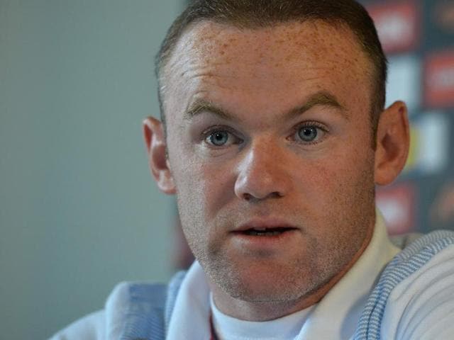 England’s Wayne Rooney goes for the ball during an international friendly football match between Spain and England at the Rico Perez Stadium in Alicante, Spain.(AP File Photo)