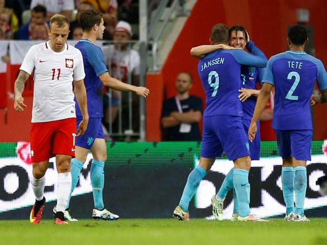 The Dutch team celebrates after scoring a goal against Poland in an international friendly, ahead of Euro 2016 kick off.(REUTERS)