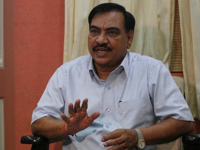 Police inspector Hiraman Shirsath, attached with Shivaji Nagar police station, in a secretly filmed video, seen claiming that Khadse forced him to “implicate” Gavande in January 2015 by asking the official to file a complaint related to “land grabbing”.(HT file photo)