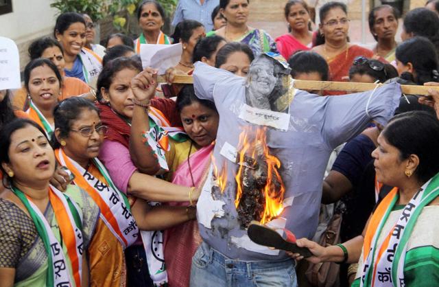 Nationalist Congress Party women activists protest against comedian and founder of All India Bakchod (AIB) Tanmay Bhat for posting a video on Facebook titled Sachin vs Lata Civil War. (PTI) Nationalist Congress Party women activists protest against comedian and founder of All India Bakchod (AIB) Tanmay Bhat for posting a video on Facebook titled Sachin vs Lata Civil War. (PTI)