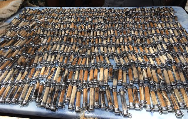 Tiger skin and bone products are laid out on a table by National Parks and Wildlife officers at the "Tiger Temple," in Saiyok district in Kanchanaburi province, west of Bangkok. (AP)