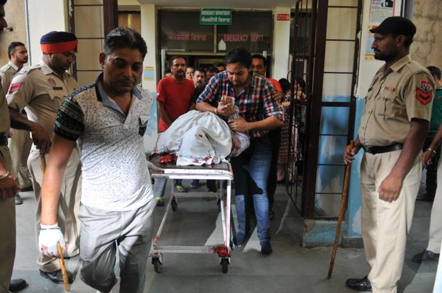 Body of the deceased being taken out of the civil hospital in Jalandhar on Friday. (Pardeep Pandit/HT Photo) Body of the deceased being taken out of the civil hospital in Jalandhar on Friday. (Pardeep Pandit/HT Photo)