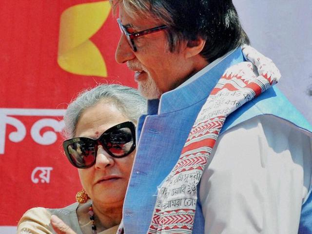 Jaya hugs Amitabh at a promotional event in Kolkata.  The couple celebrates 43rd wedding anniversary on Friday.  (PTI) 