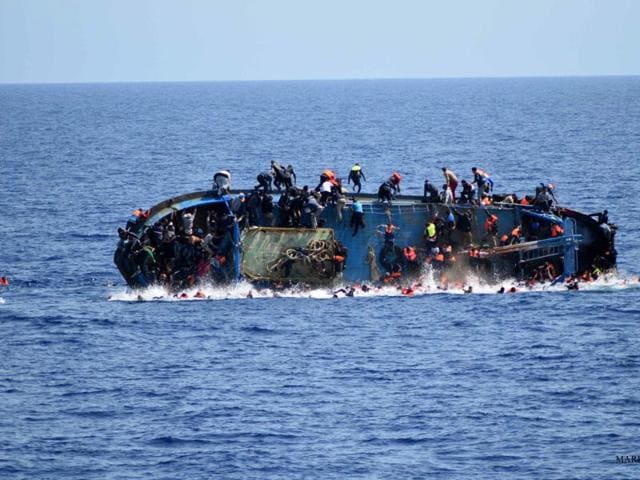 More than 300 migrants were rescued and three bodies recovered off the Greek island of Crete after a boat carrying at least 700 people capsized. (AP File Photo) More than 300 migrants were rescued and three bodies recovered off the Greek island of Crete after a boat carrying at least 700 people capsized. (AP File Photo)