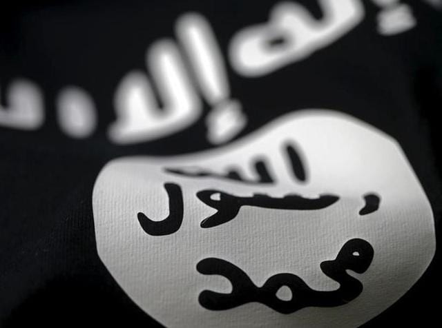 An Islamic State flag is seen in this picture illustration taken February 18, 2016. An Islamic State flag is seen in this picture illustration taken February 18, 2016.