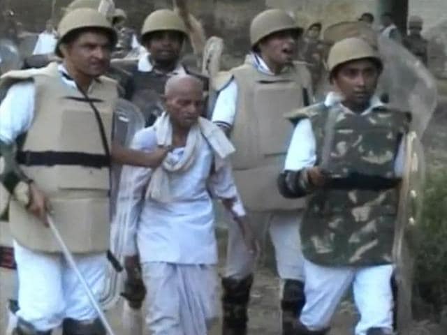 Image made from video shows paramilitary soldiers detaining an unidentified man from the site of violent clashes in Mathura on June 2, 2016. (AP)