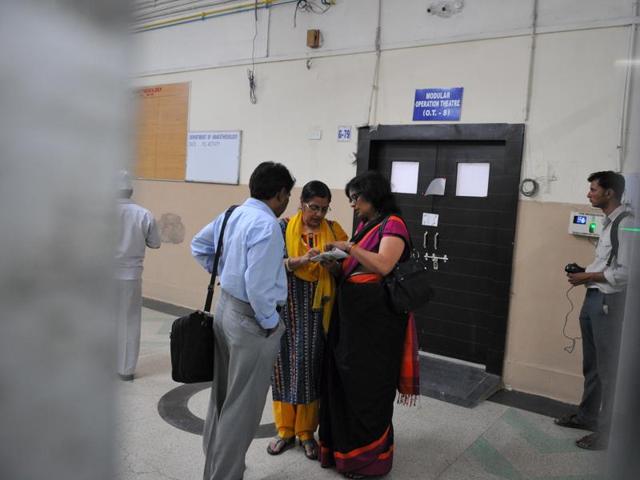 The investigation team visits MY Hospital to probe into the death of two children, in Indore on Thursday.(Shankar Mourya/HT photo)