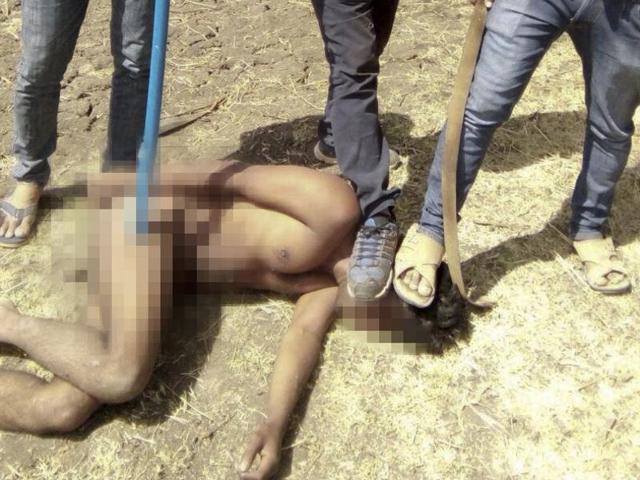 A mob of around 150 people thrashed three alleged cow transporters and stripped one of them naked in BJP-ruled Rajasthan’s Pratapgarh district on Tuesday, the latest in a spate of violence over bovine trade and beef consumption.(Hindustan Times) A mob of around 150 people thrashed three alleged cow transporters and stripped one of them naked in BJP-ruled Rajasthan’s Pratapgarh district on Tuesday, the latest in a spate of violence over bovine trade and beef consumption.(Hindustan Times)