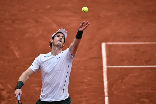 Great Britain's Andy Murray serves the ball to France's Richard Gasquet during their men's quarterfinal match at the Roland Garros 2016 French Open in Paris (AFP Photo)