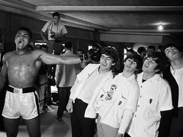 American heavyweight boxer Cassius Clay (later Muhammad Ali) takes on the Beatles. (Getty Images) American heavyweight boxer Cassius Clay (later Muhammad Ali) takes on the Beatles. (Getty Images)
