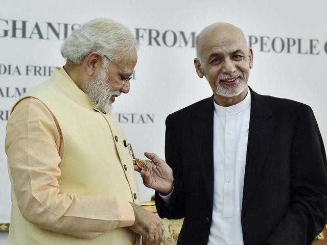 Prime Minister Narendra Modi being conferred with Afghanistan's highest civilian honour, the Amir Amanullah Khan Award by Afghan President Ashraf Ghani in Herat, Afghanistan on June 4, 2016. (PTI) Prime Minister Narendra Modi being conferred with Afghanistan's highest civilian honour, the Amir Amanullah Khan Award by Afghan President Ashraf Ghani in Herat, Afghanistan on June 4, 2016. (PTI)