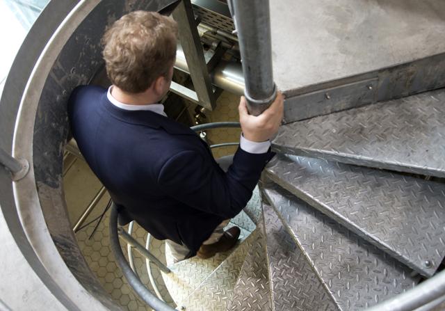 Brewer Xavier Vanneste walks down a spiral staircase toward underground pipes at the Halve Maan Brewery in Bruges, Belgium on Thursday, May 26, 2016. (AP) Brewer Xavier Vanneste walks down a spiral staircase toward underground pipes at the Halve Maan Brewery in Bruges, Belgium on Thursday, May 26, 2016. (AP)