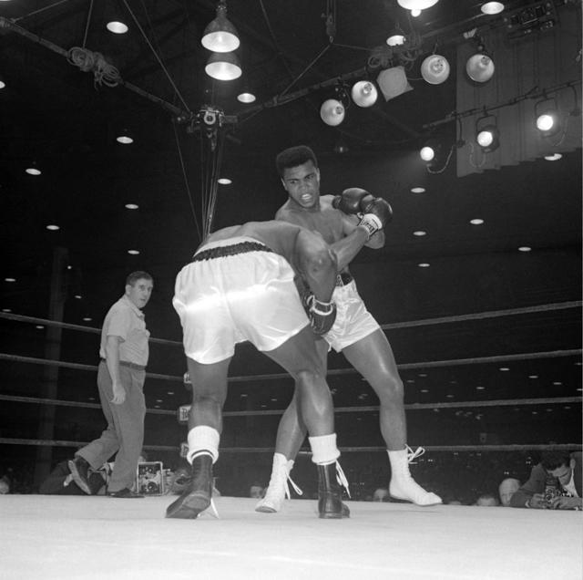 A picture taken February 25, 1964, in Miami, during the match at the end of which the American Cassius Clay (Muhammad Ali) (R) became world heavyweight boxing champion against his compatriot Sonny Liston. (AFP) A picture taken February 25, 1964, in Miami, during the match at the end of which the American Cassius Clay (Muhammad Ali) (R) became world heavyweight boxing champion against his compatriot Sonny Liston. (AFP)