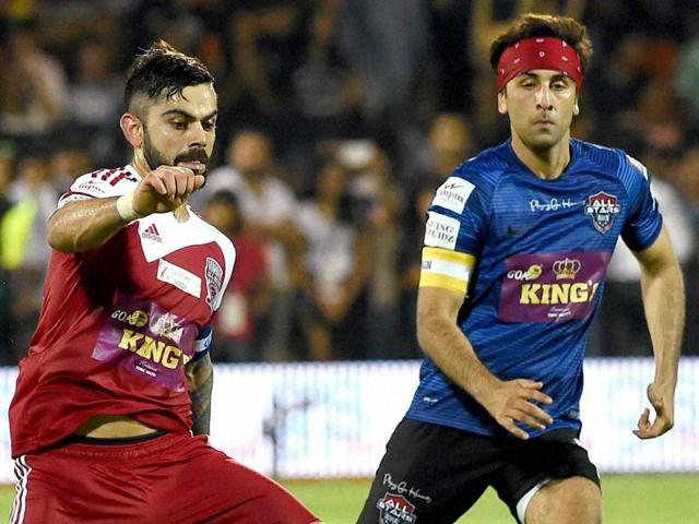 Ranbir Kapoor (R) and Virat Kohli in action during a charity football match in Mumbai. (PTI Photo) Ranbir Kapoor (R) and Virat Kohli in action during a charity football match in Mumbai. (PTI Photo)