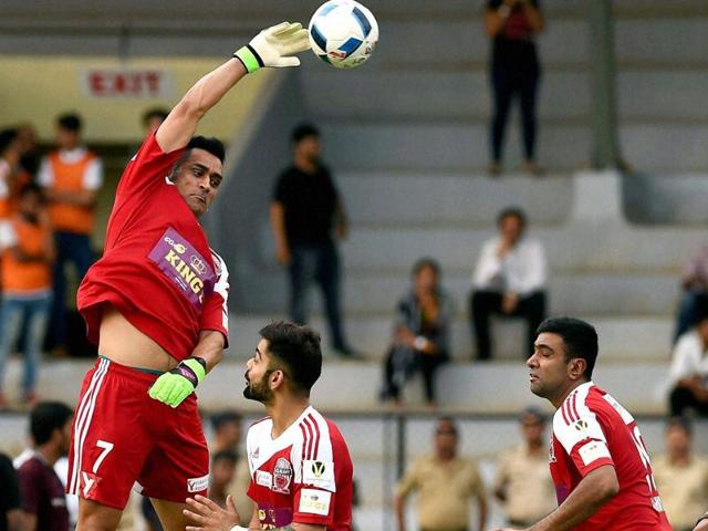 M S Dhoni, Virat Kohli and R Ashwin in action during a charity football match in Mumbai. (PTI Photo) M S Dhoni, Virat Kohli and R Ashwin in action during a charity football match in Mumbai. (PTI Photo)