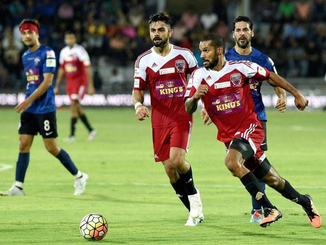 Ranbir Kapoor, Virat Kohli, Shikhar Dhawan and Dino Morea in action during a charity football match in Mumbai on Saturday. (PTI Photo) Ranbir Kapoor, Virat Kohli, Shikhar Dhawan and Dino Morea in action during a charity football match in Mumbai on Saturday. (PTI Photo)