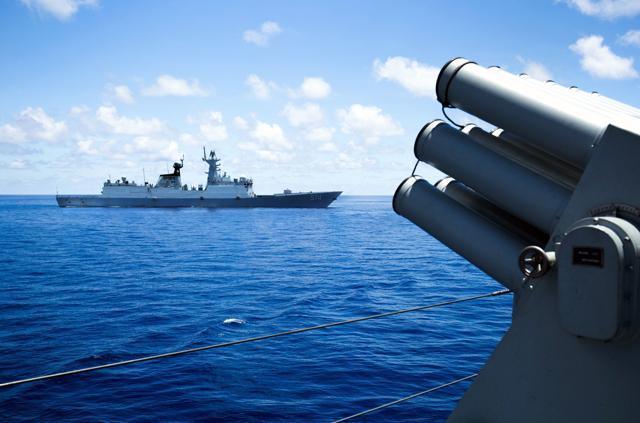 This photo taken on May 10, 2016 shows crew members of China's South Sea Fleet taking part in a logistics supply drill near the James Shoal area on South China Sea. (AFP file photo) This photo taken on May 10, 2016 shows crew members of China's South Sea Fleet taking part in a logistics supply drill near the James Shoal area on South China Sea. (AFP file photo)