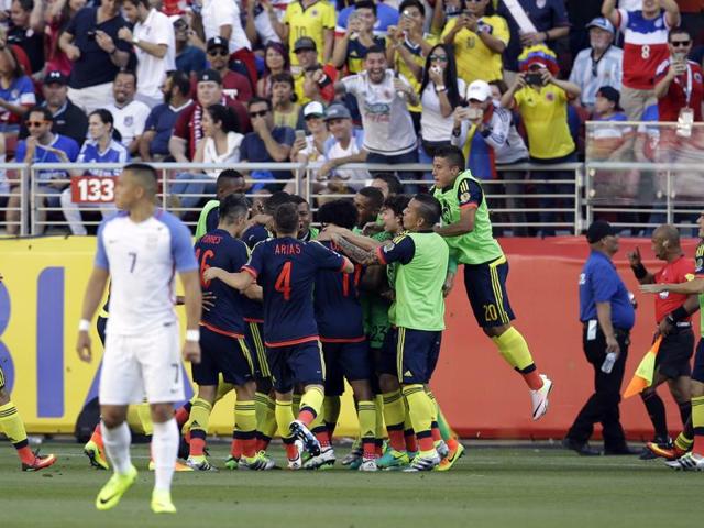 Colombia's players celebrate their team's first goal in a Copa America Centenario Group A football match against the US. (AP Photo) Colombia's players celebrate their team's first goal in a Copa America Centenario Group A football match against the US. (AP Photo)