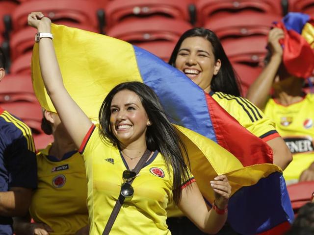 A fan waves the Colombia flag before the opening match of the Copa America Centenario. (AP Photo) A fan waves the Colombia flag before the opening match of the Copa America Centenario. (AP Photo)