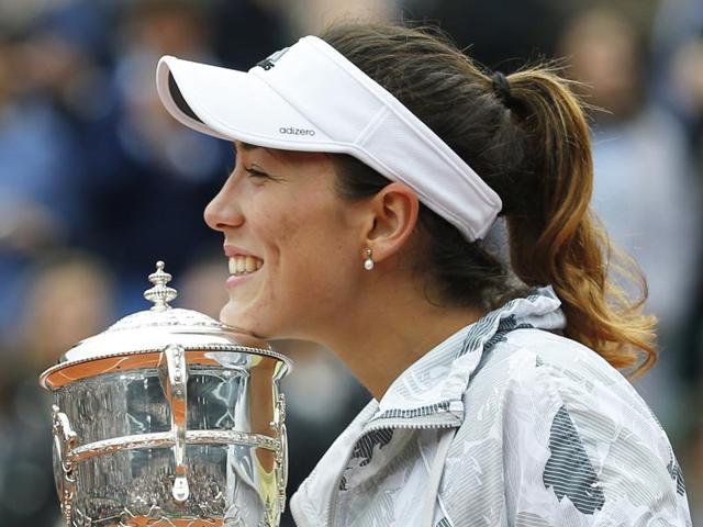 Spain's Garbine Muguruza holds the trophy after winning the final of the French Open tennis tournament. (AP Photo) Spain's Garbine Muguruza holds the trophy after winning the final of the French Open tennis tournament. (AP Photo)