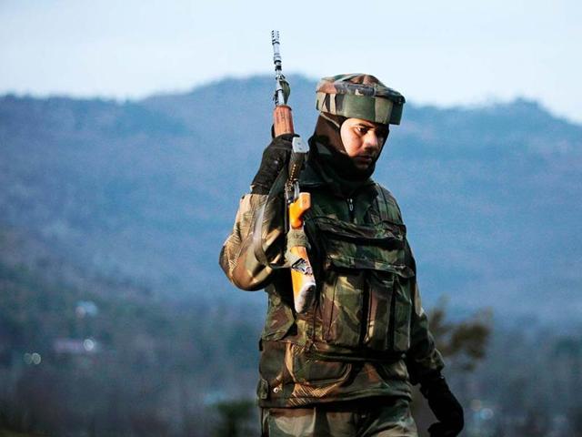 File photo of Indian Army soldiers as they patrol near the Line of Control, after a reported cease-fire violation, in Mendhar, Poonch district. (AP Photo) File photo of Indian Army soldiers as they patrol near the Line of Control, after a reported cease-fire violation, in Mendhar, Poonch district. (AP Photo)