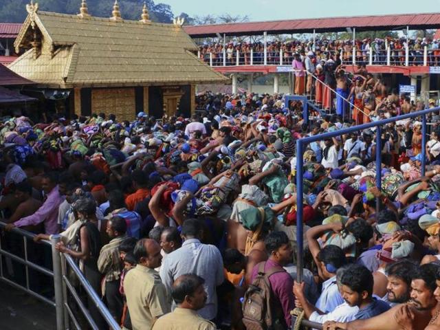 File photo of worshippers during a pilgrimage at the Sabarimala temple in the southern Indian state of Kerala. (AP) File photo of worshippers during a pilgrimage at the Sabarimala temple in the southern Indian state of Kerala. (AP)