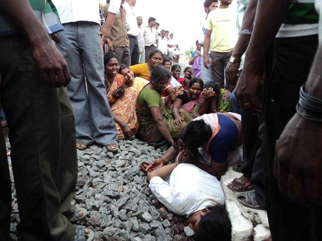 Relatives of 19-year-old Dalit student E Ilavarasan mourn by the railway tracks where he was found dead in 2013, after he eloped with a woman from another caste. (Photo: New Indian Express) Relatives of 19-year-old Dalit student E Ilavarasan mourn by the railway tracks where he was found dead in 2013, after he eloped with a woman from another caste. (Photo: New Indian Express)