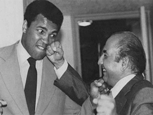 A file photo of late Music legend Mohammed Rafi with Heavyweight boxing icon Muhammad Ali. (PTI Photo) A file photo of late Music legend Mohammed Rafi with Heavyweight boxing icon Muhammad Ali. (PTI Photo)