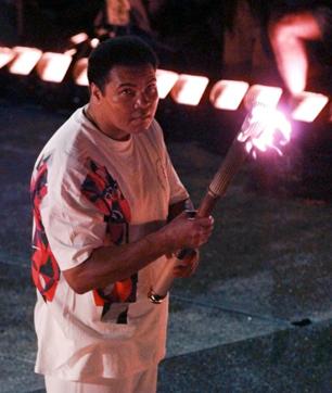 Muhammad Ali watches as the flame climbs up to the Olympic torch during the opening ceremonies of the Summer Olympics, in Atlanta. (AP Photo)