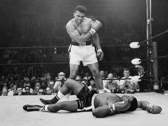 In this May 25, 1965, file photo, heavyweight champion Muhammad Ali, stands over challenger Sonny Liston, shouting and gesturing shortly after dropping Liston with a short hard right to the jaw, in Lewiston, Maine.(AP Photo)